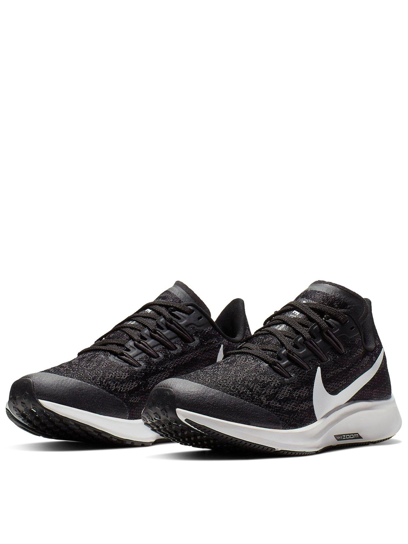 black and white nike trainers junior