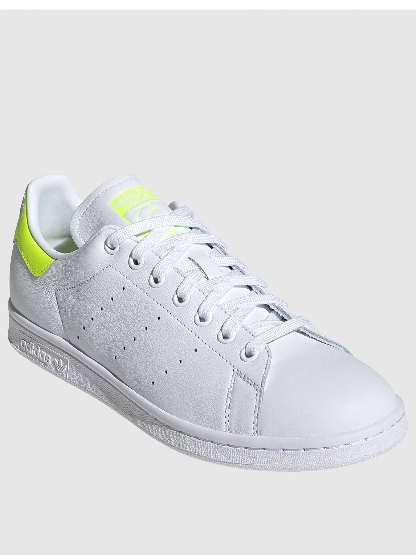 white and yellow stan smith