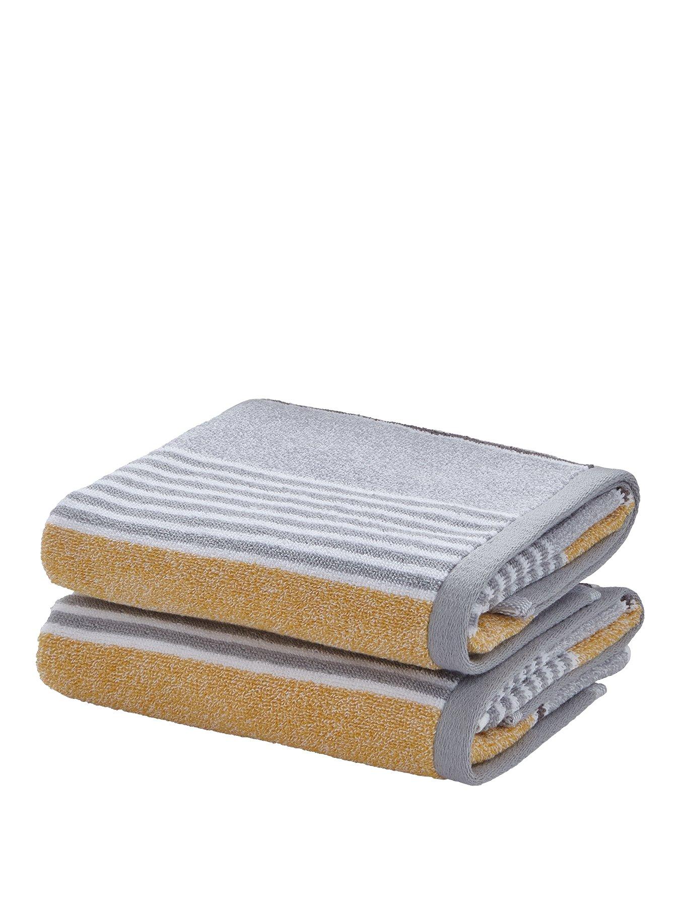yellow and grey bath towels