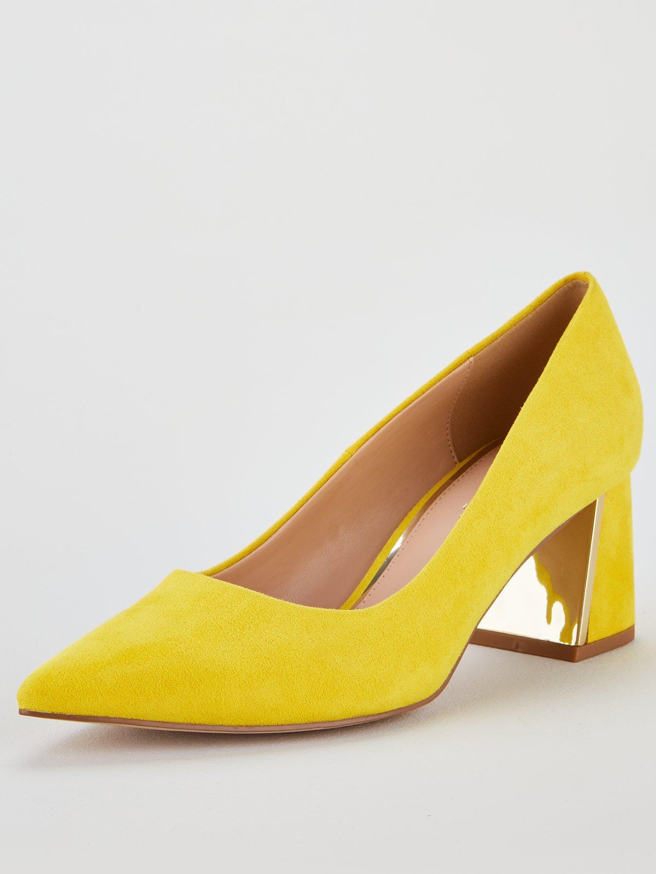 yellow suede court shoes