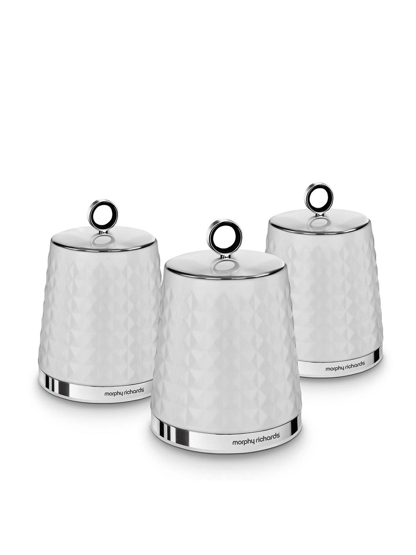 white and silver tea coffee sugar canisters