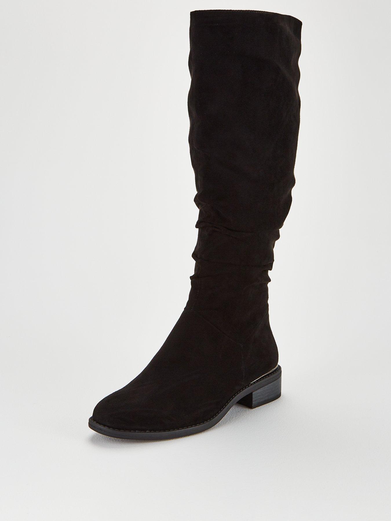 black fitted knee high boots