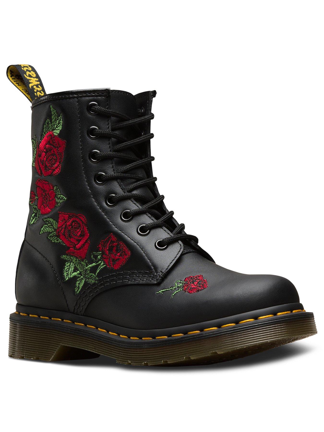 black doc martens with red roses