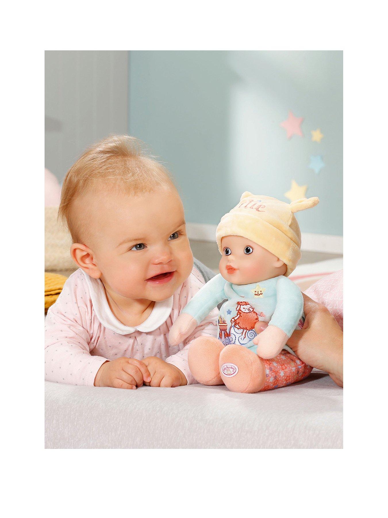 newborn baby annabell with rattle