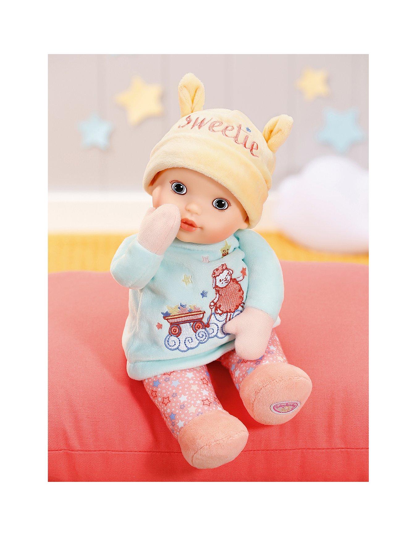 newborn baby annabell with rattle