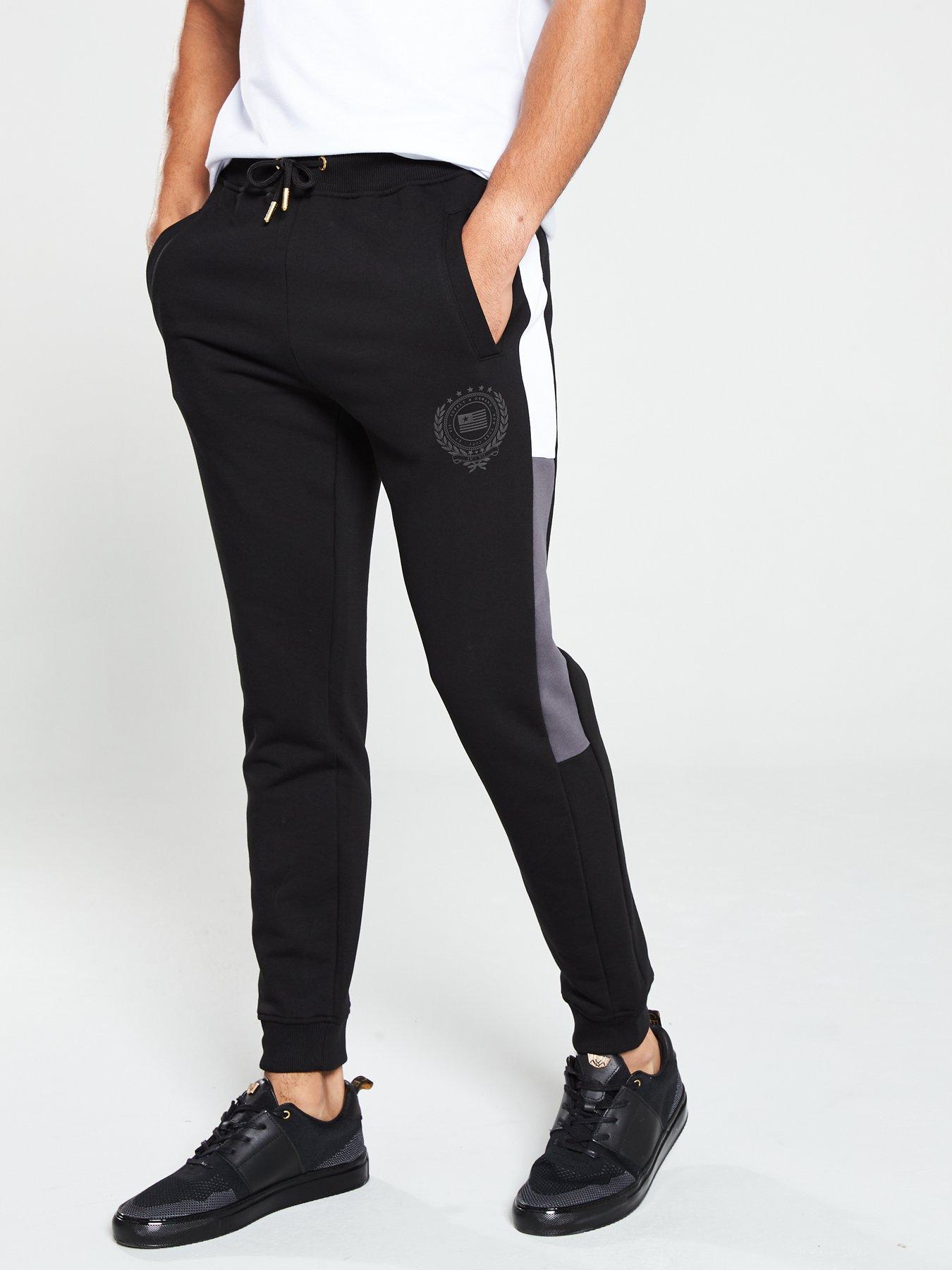 black and gold supply and demand tracksuit