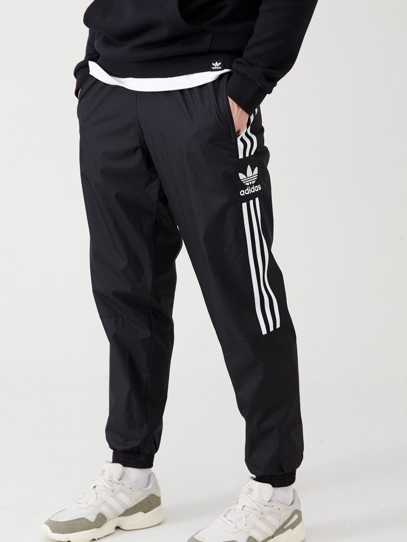 adidas locked up logo track pants