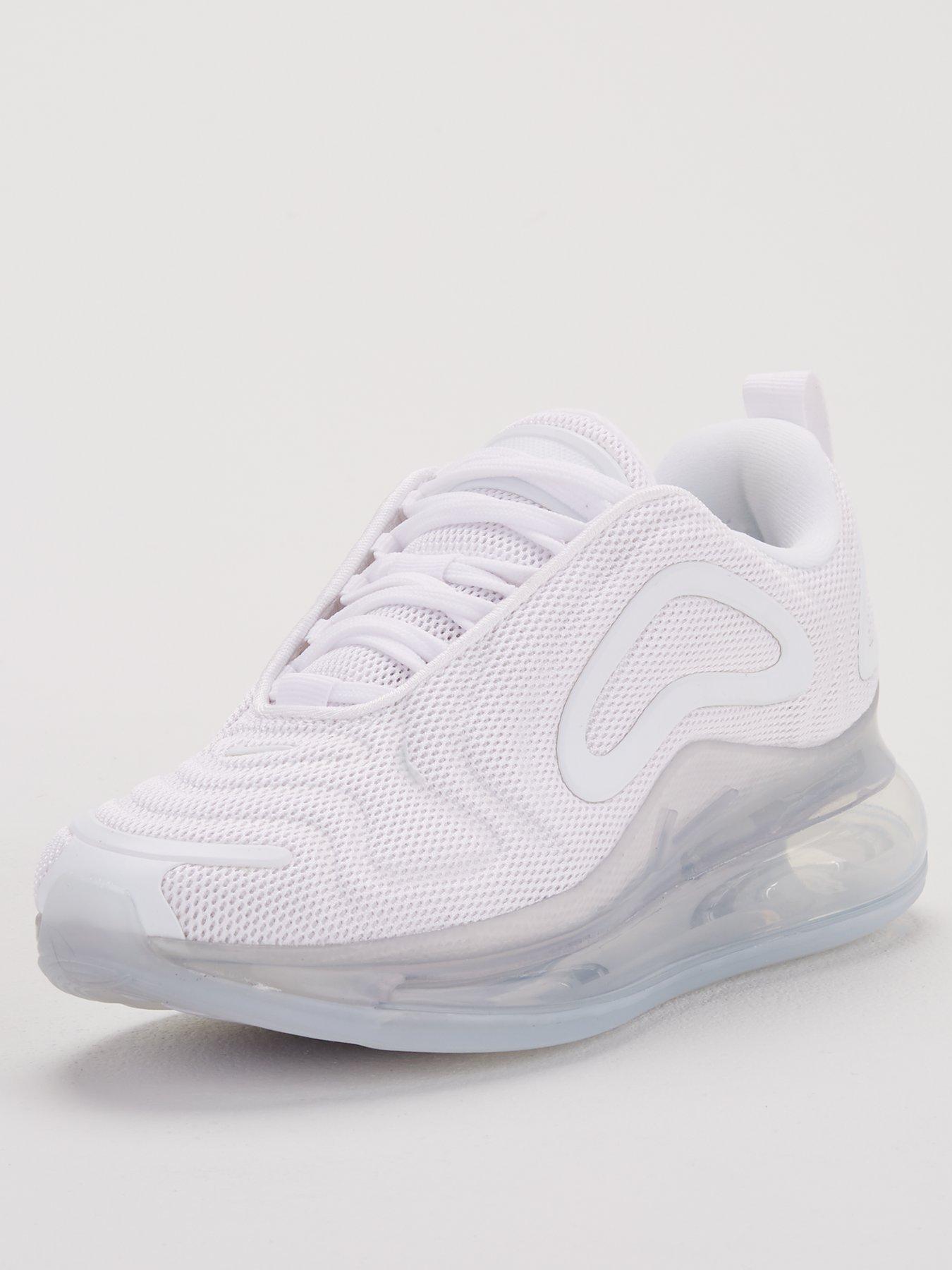 white and grey nike trainers