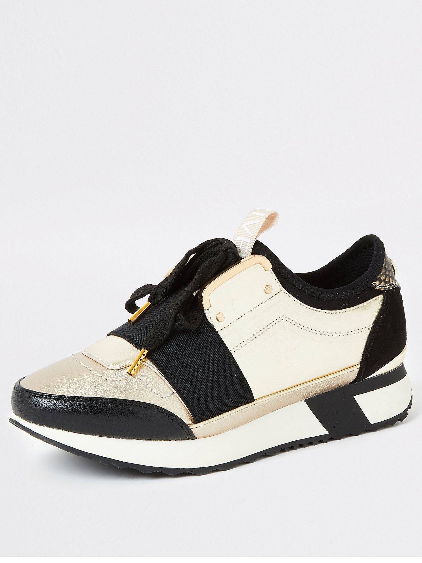 river island gold trainers