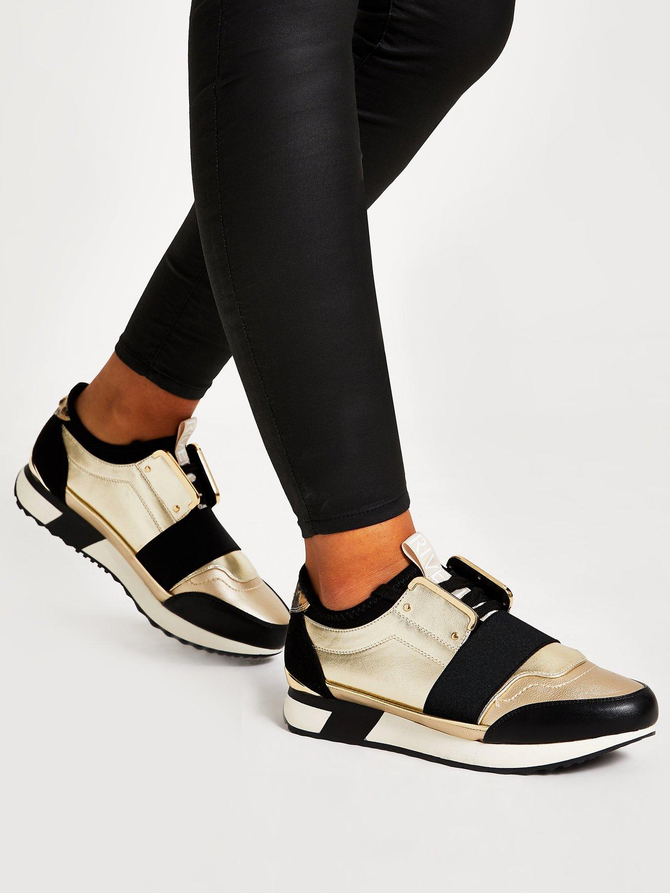 river island black and gold trainers