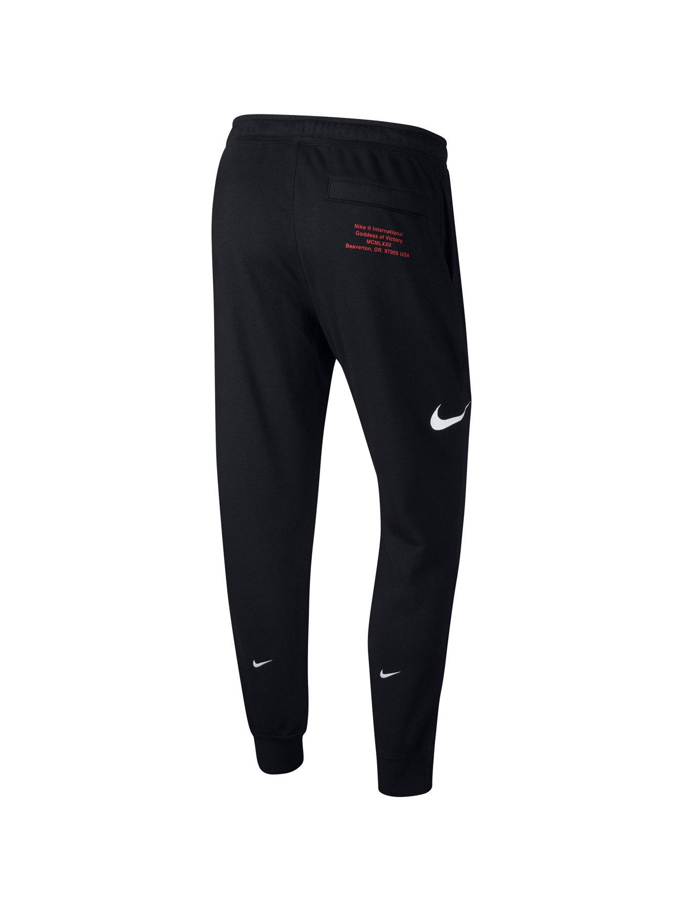 nike swoosh trousers