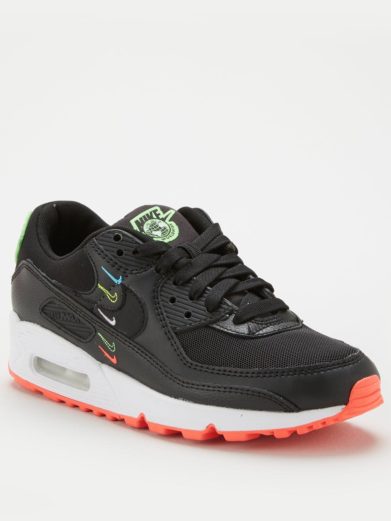 black and green nike trainers