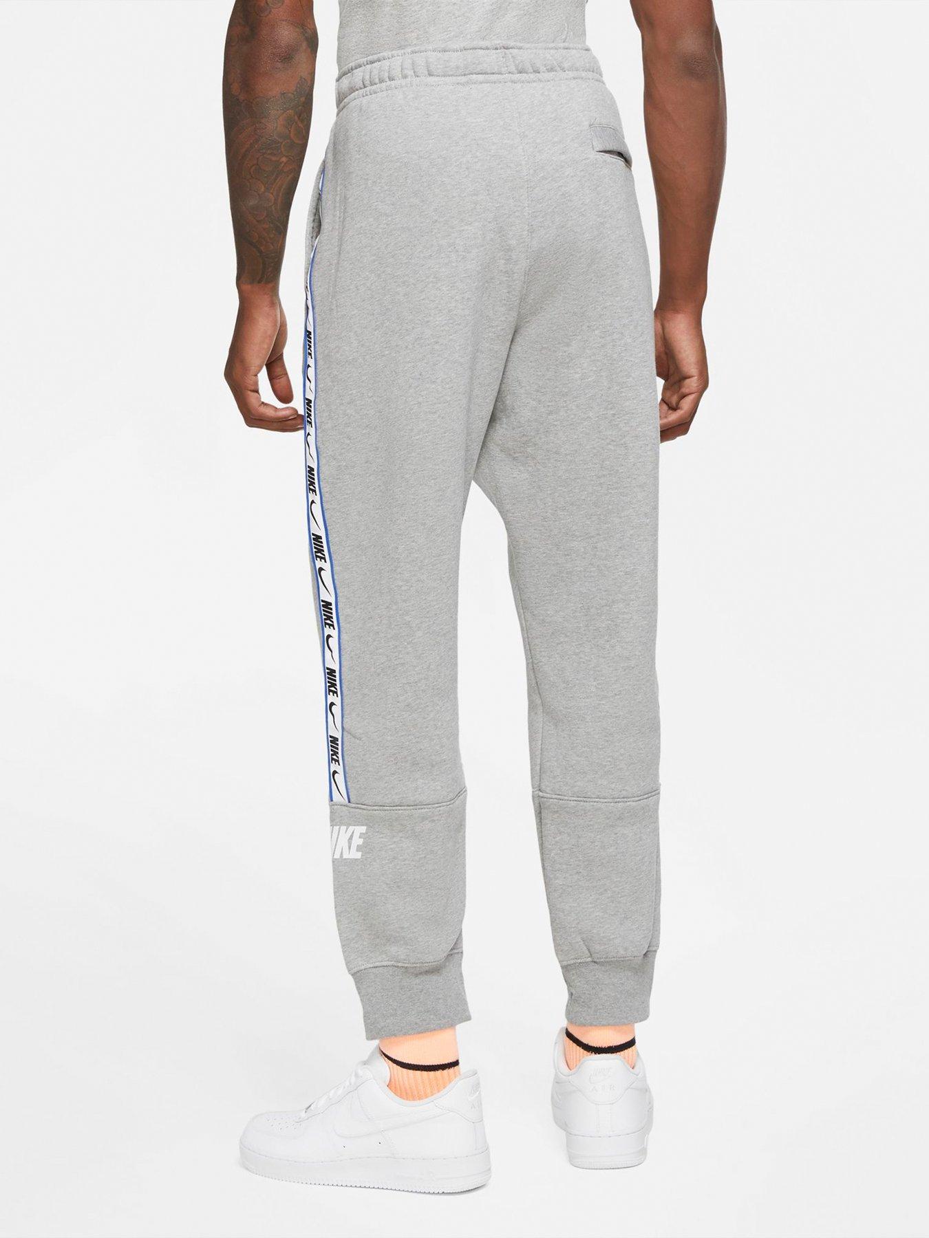 nike grey tape joggers