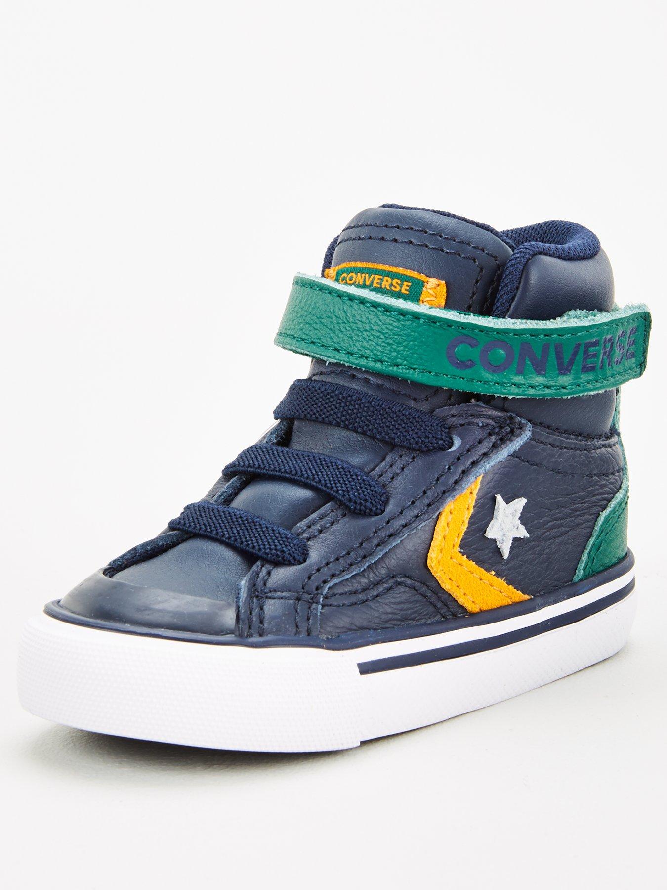 grey and yellow trainers