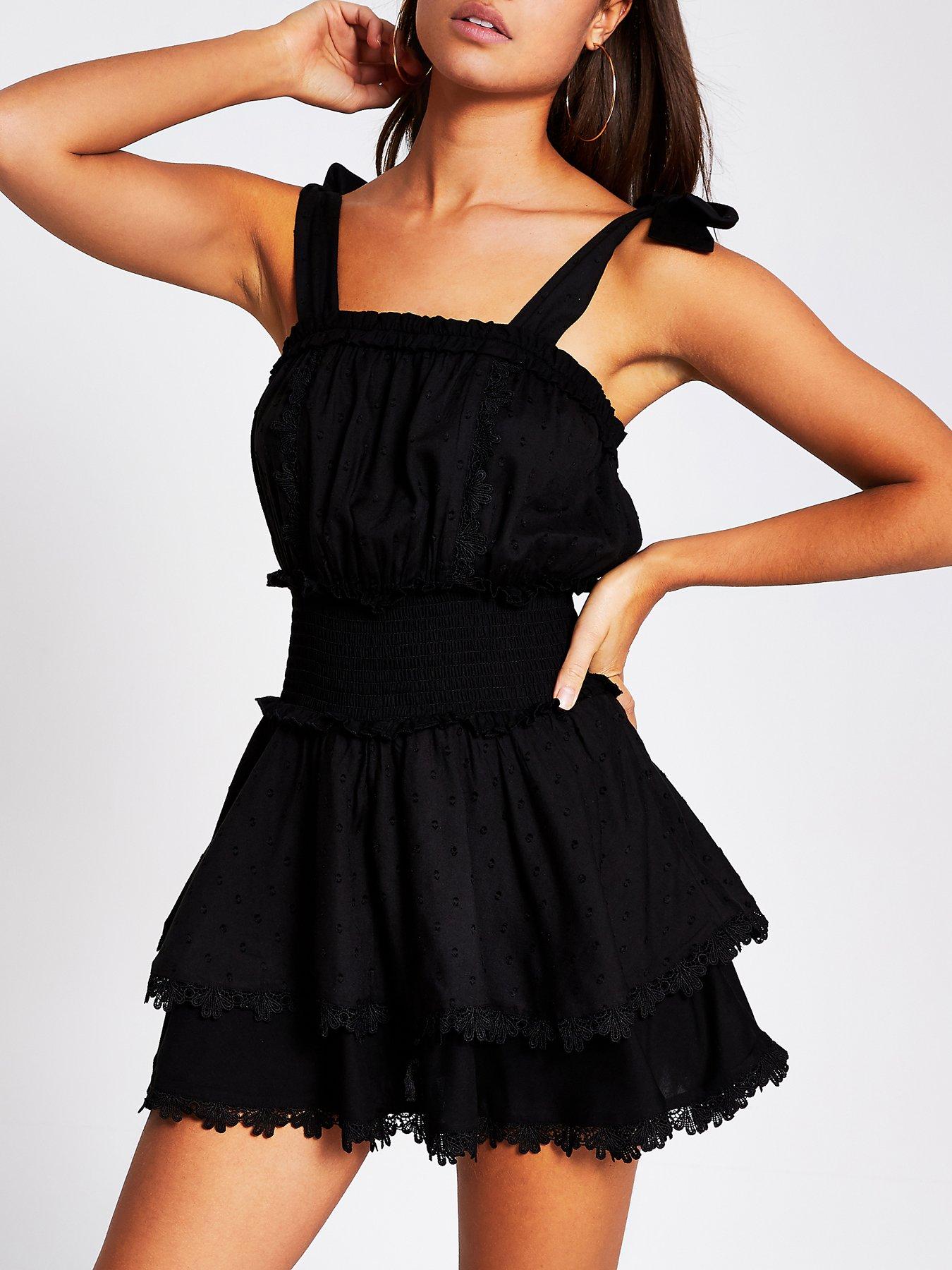 black ruffle playsuit