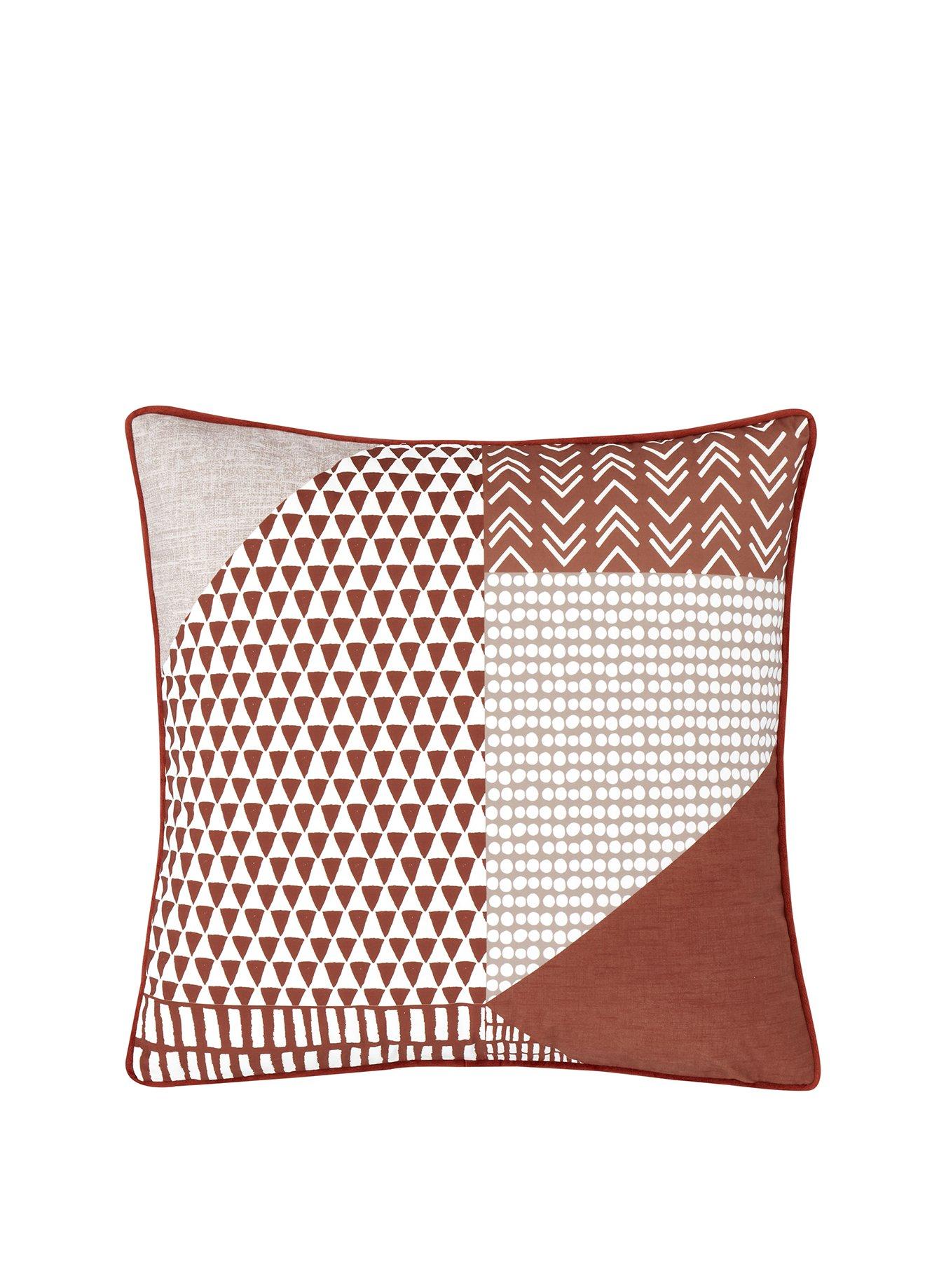 orange cushions and throws