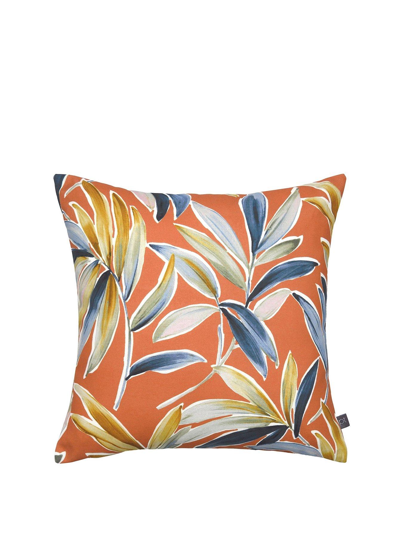orange cushions and throws